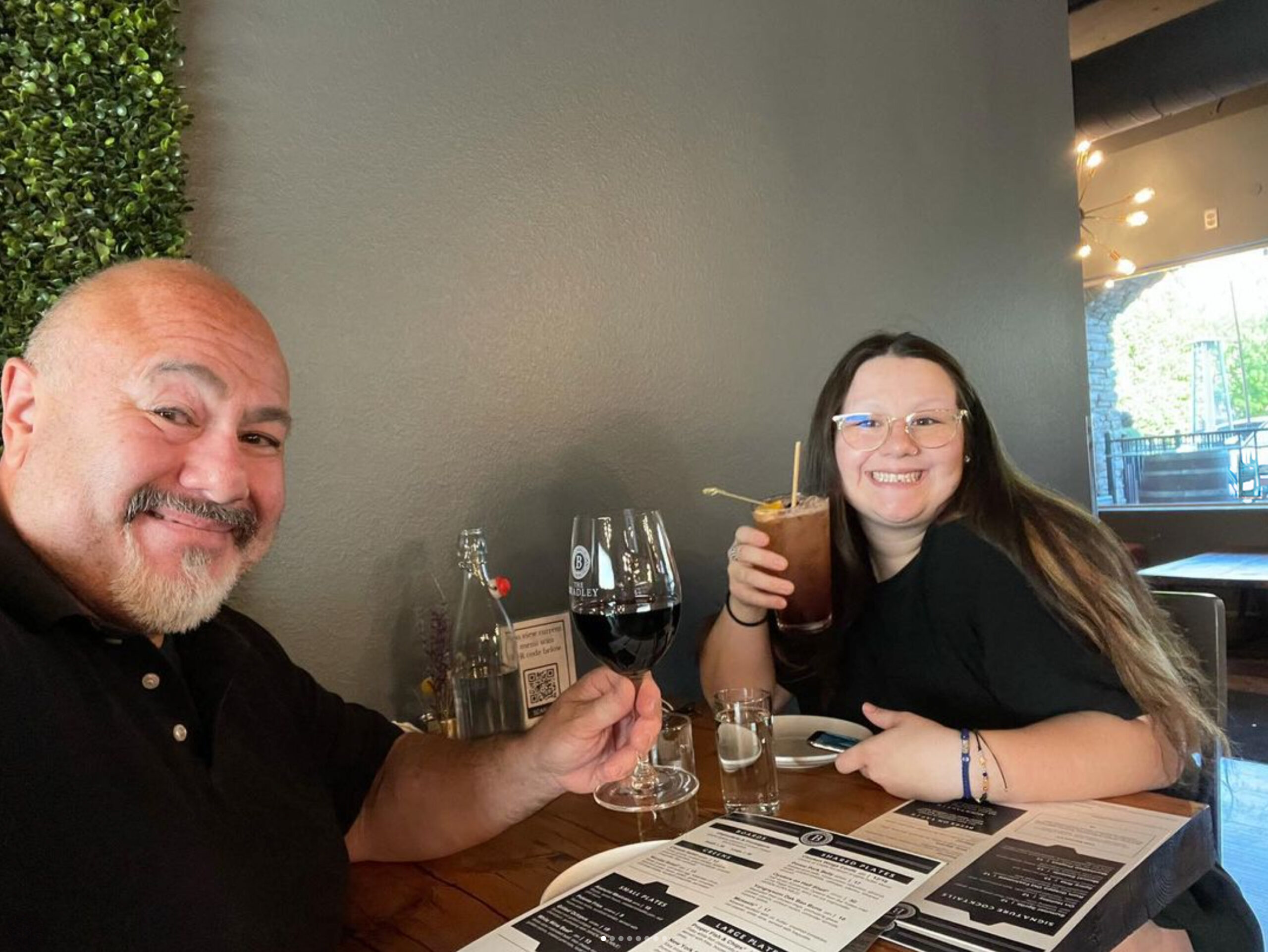 the Bradley – the date night place couple enjoying drinks